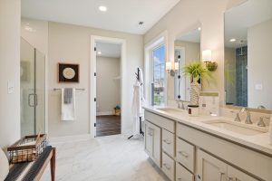 Modern main-level primary bathroom in the Bayberry floor plan home