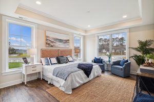 Modern main-level primary bedroom in the Bayberry floor plan home