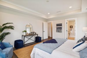 Modern main-level primary bedroom in the Bayberry floor plan home