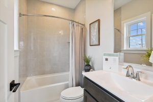 Modern upper-level bathroom in the Bayberry floor plan home