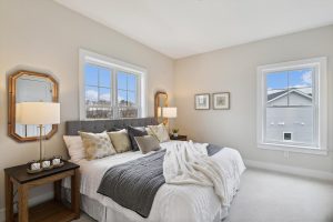 Cozy upper-level bedroom in the Bayberry floor plan home