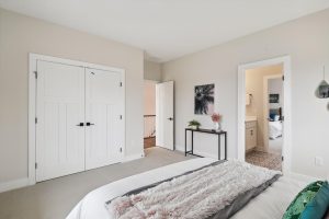 Cozy upper-level bedroom in the Bayberry floor plan home