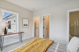 Cozy upper-level bedroom in the Bayberry floor plan home